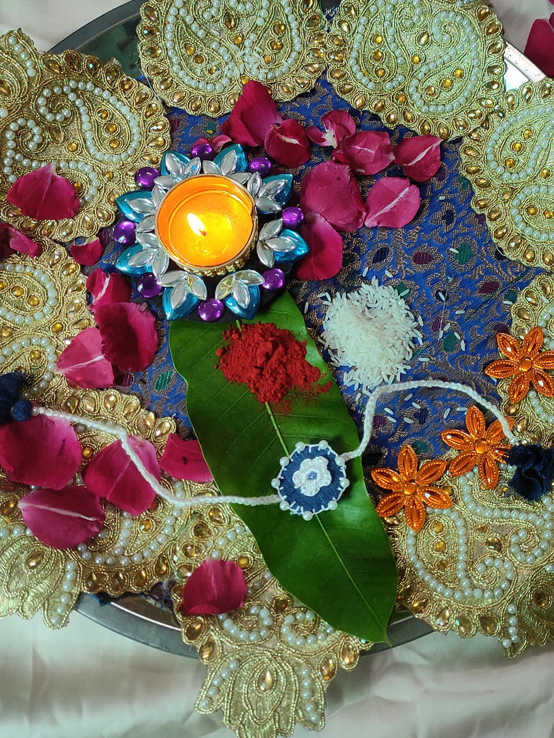 Blue moon handmade crochet rakhi with tulsi hand tag