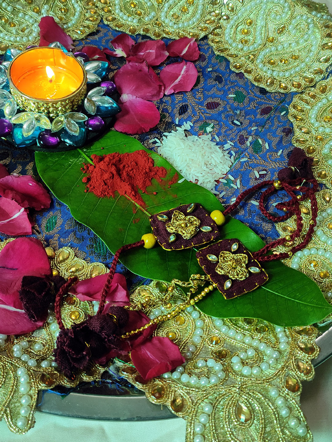 Eco maroon luma rakhi set for your best bhai-bhabhi jodi straight from our rakhi2025 edit