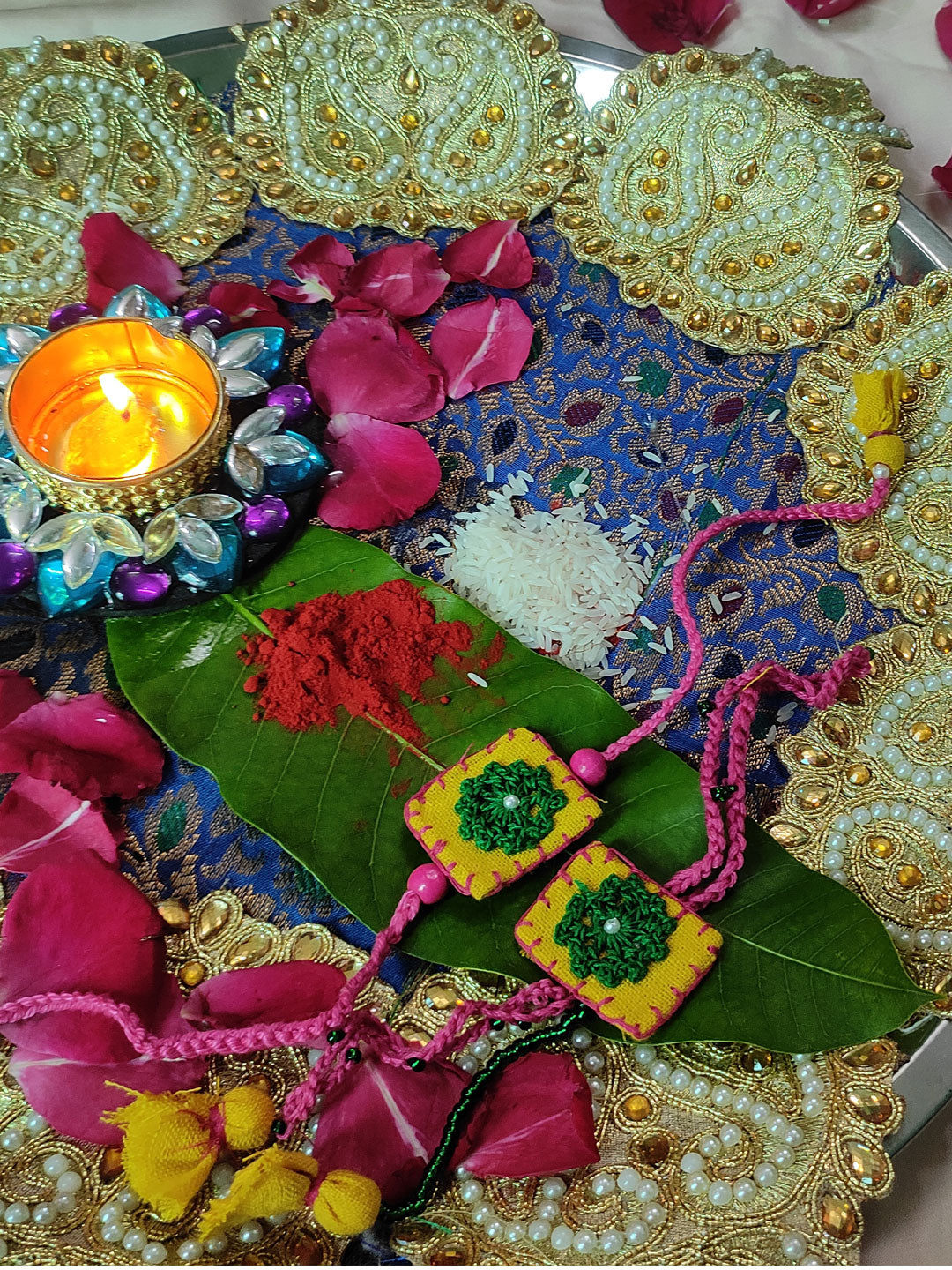 Handmade crochet rakhi using upcycled fabric of kala cotton, is one of a kind for your favurite bhai & bhabhi duo